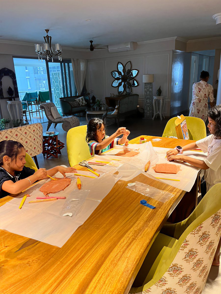 Child building a hands-on Owtofbox kit at home.