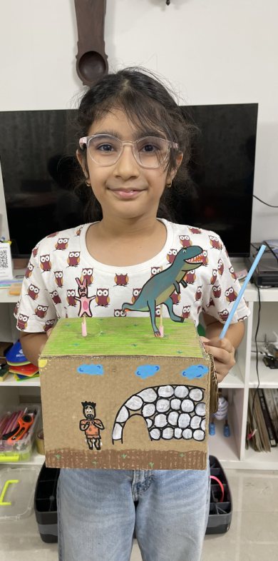 Children at Owtofbox workshops — building, painting and investigating together
