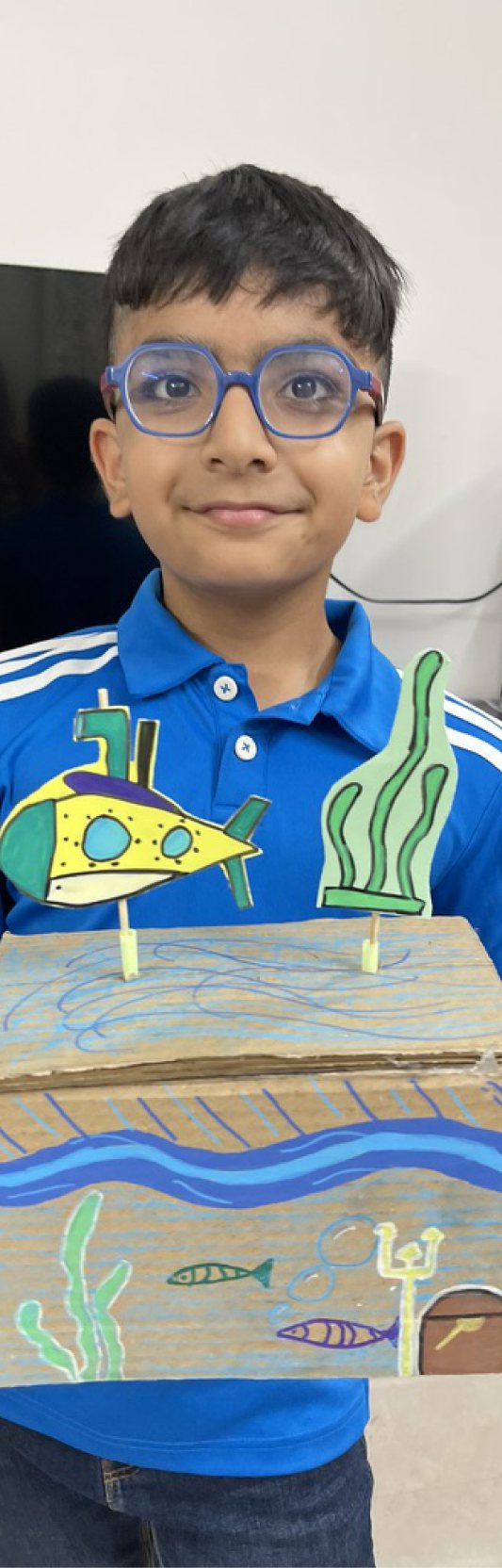 Children at Owtofbox workshops — building, painting and investigating together
